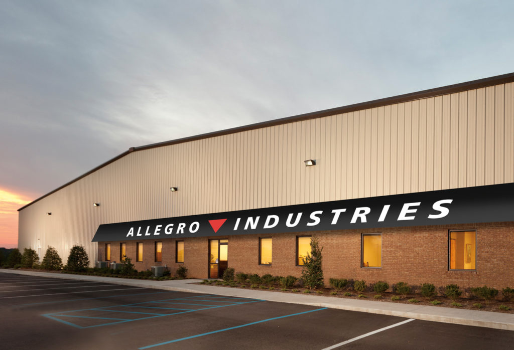 Allegro Industries building at night