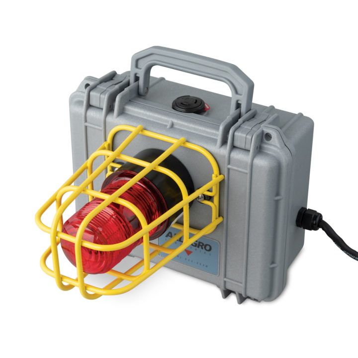 Gray Remote CO Alarm with Red Strobe Light and Yellow Cage around Light